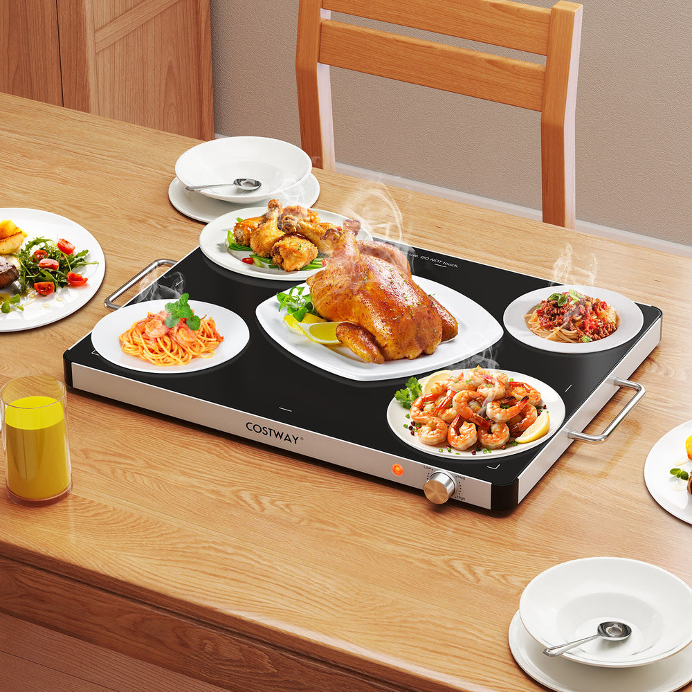 Electric warming food warmer on a wooden table, featuring adjustable temperature control for buffets and gatherings.