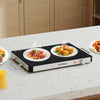 Electric warming tray with flexible temperature control and overheat protection, perfect for keeping food warm at.