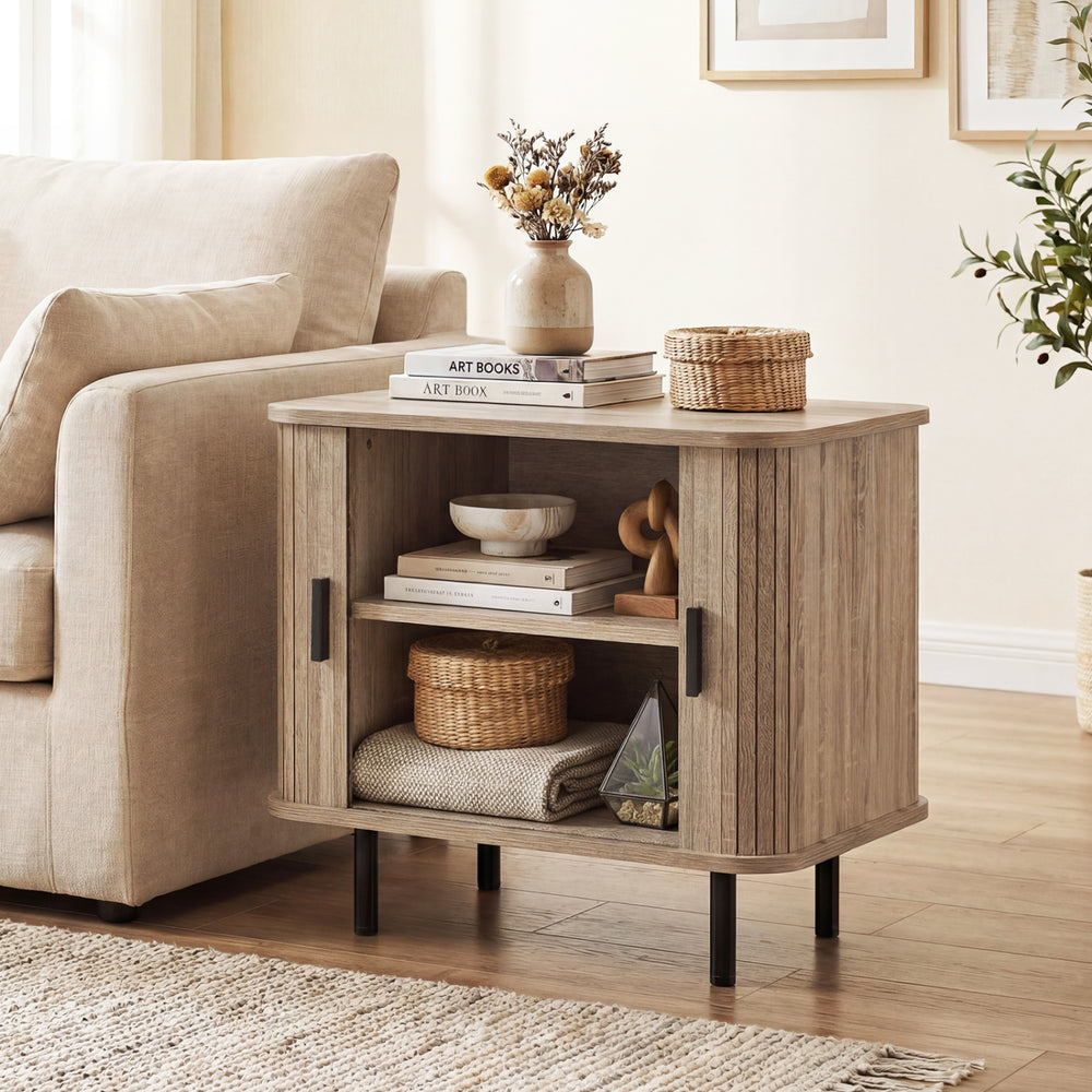 Modern mid-century end table with sliding tambour doors, natural finish, and two-tier storage shelf for stylish.