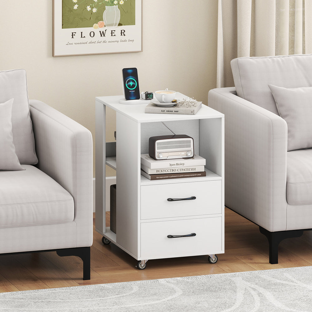 End table on wheels in white with built-in charging station, two drawers, and three open shelves for versatile storage.