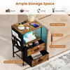 End table with spacious tabletop, 2 fabric drawers, and built-in charging station for convenient organization and.