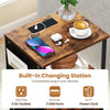 End table with charging station featuring 2 AC outlets, 2 USB ports, and spacious tabletop for personal items.