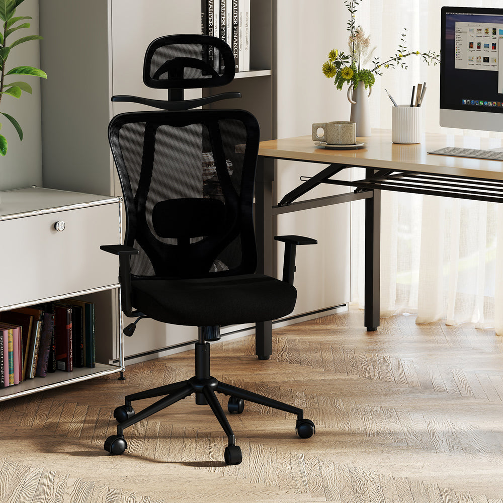 Ergonomic black office chair with 3D headrest, adjustable lumbar support, and reclining backrest for optimal comfort.