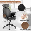Ergonomic office chair with headrest in black faux leather, featuring adjustable height and artistic wood-like surface.