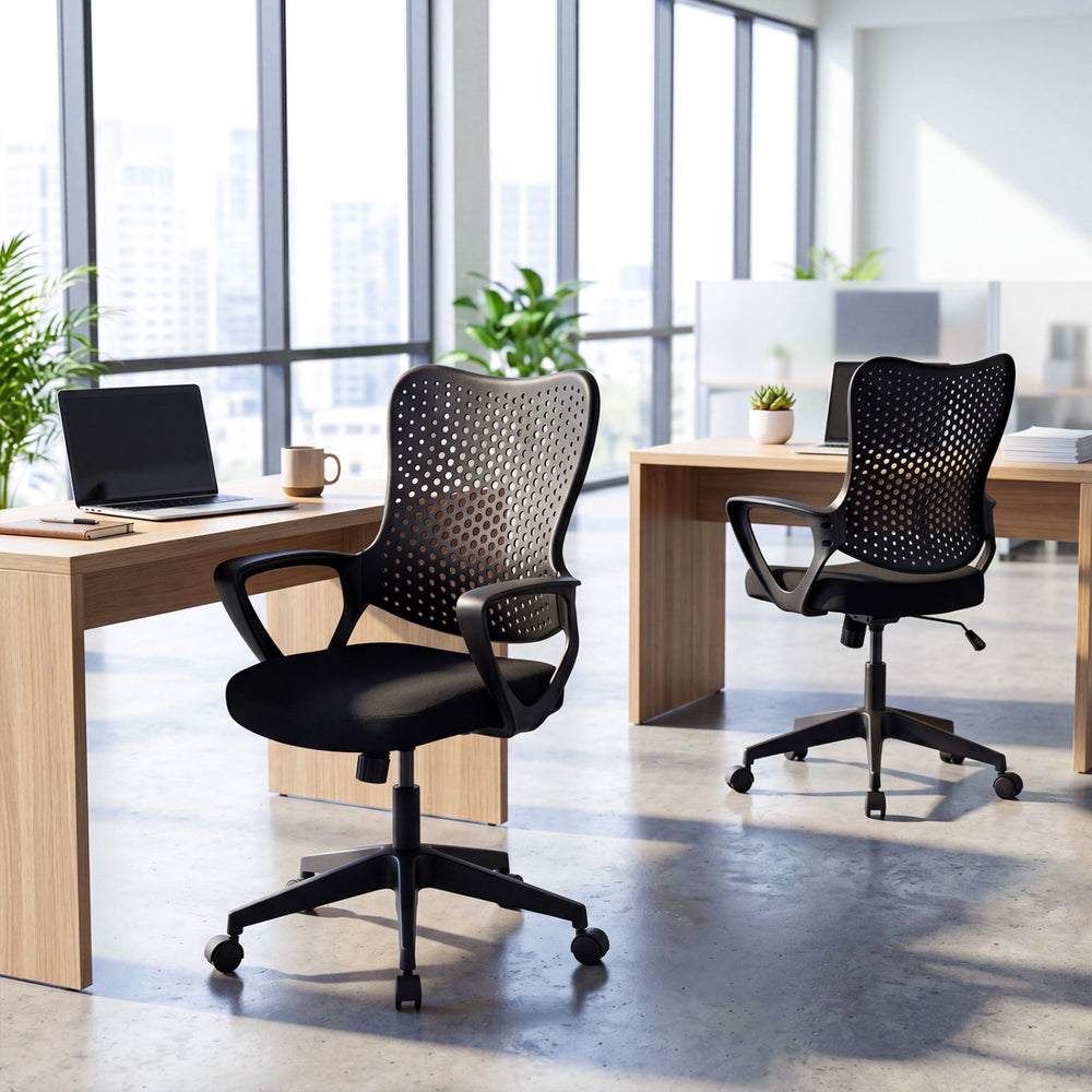 Height adjustable ergonomic office chair with breathable butterfly back, shown in a modern office setting.