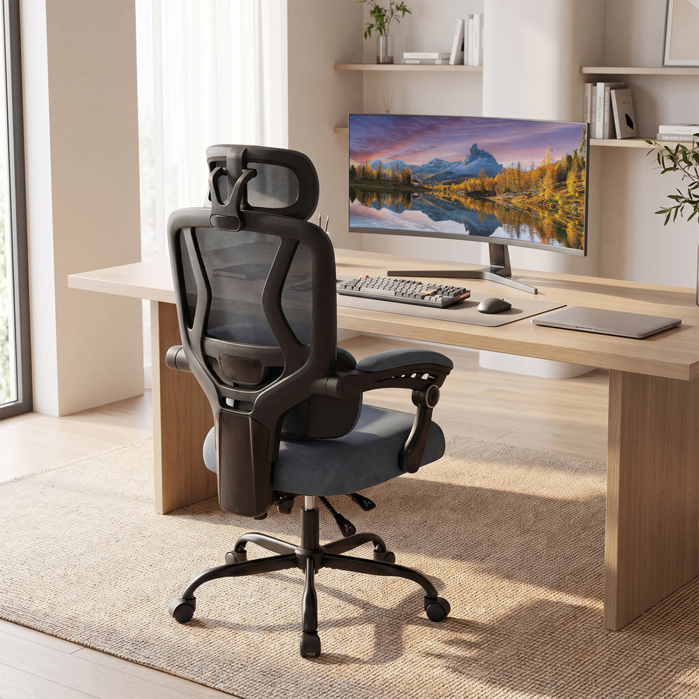 Ergonomic gray office chair featuring a soft sponge seat cushion and breathable mesh for all-day comfort and support.