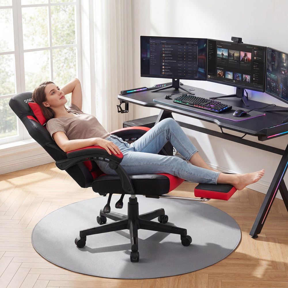 Ergonomic red video game chair with reclining backrest and retractable footrest, perfect for gaming or relaxing.