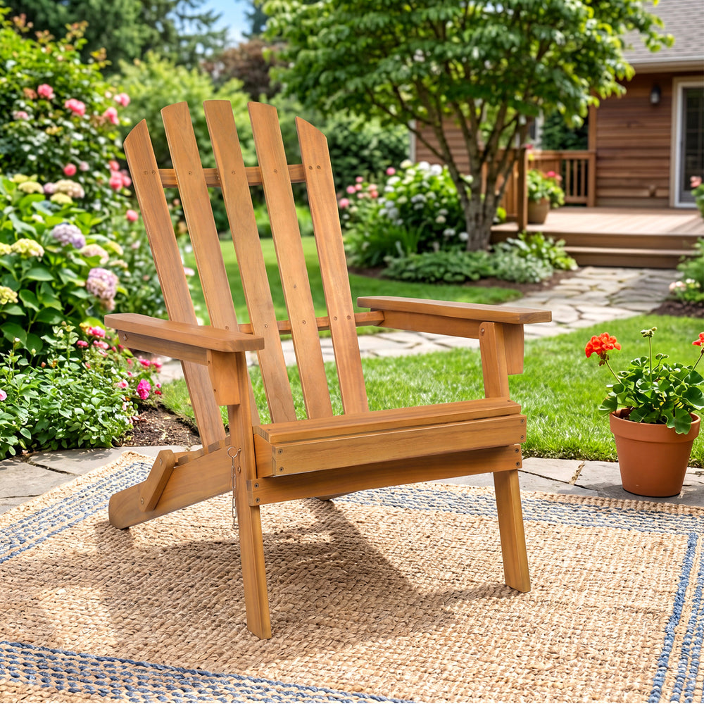 Oversized folding Adirondack chair made of durable acacia wood, featuring a comfortable inclined backrest for outdoor relaxation.