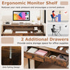 Extendable computer desk in rustic brown with ergonomic monitor shelf and two storage drawers for home office use.