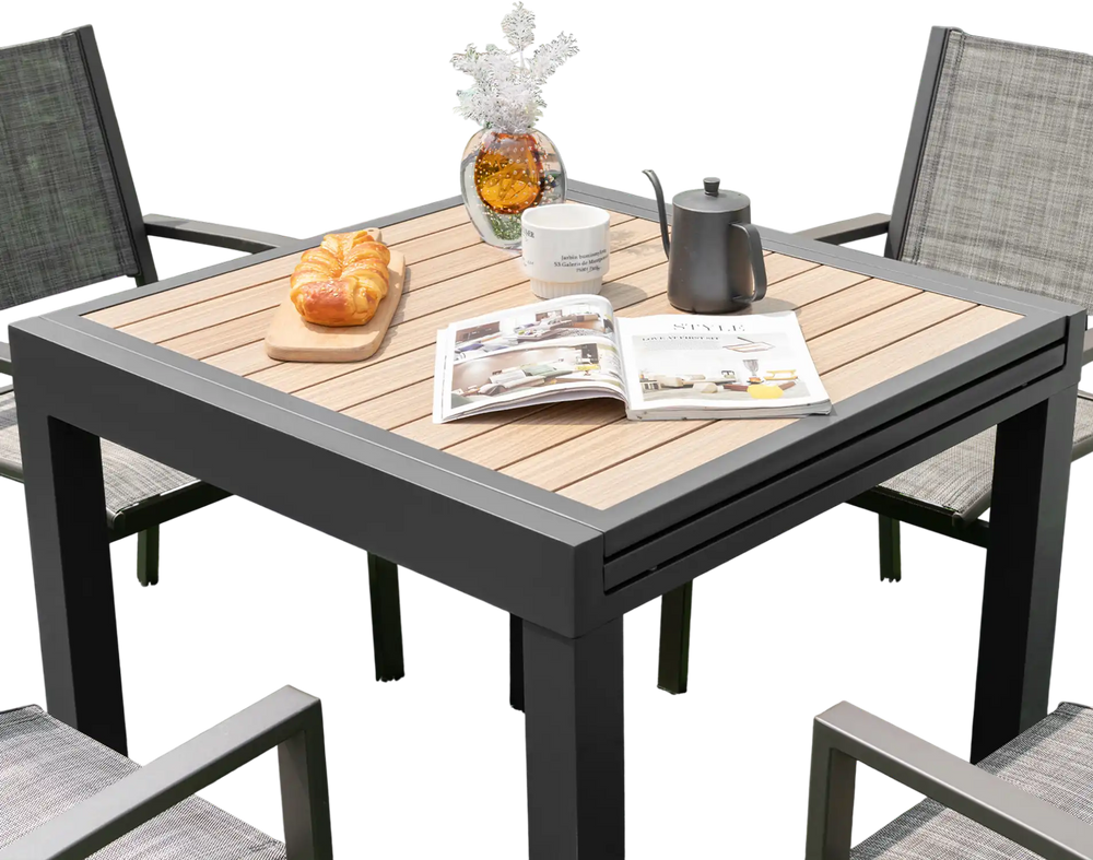 Patio table set in outdoor setting, featuring a natural wood-like top and rustproof aluminum, ideal for social.