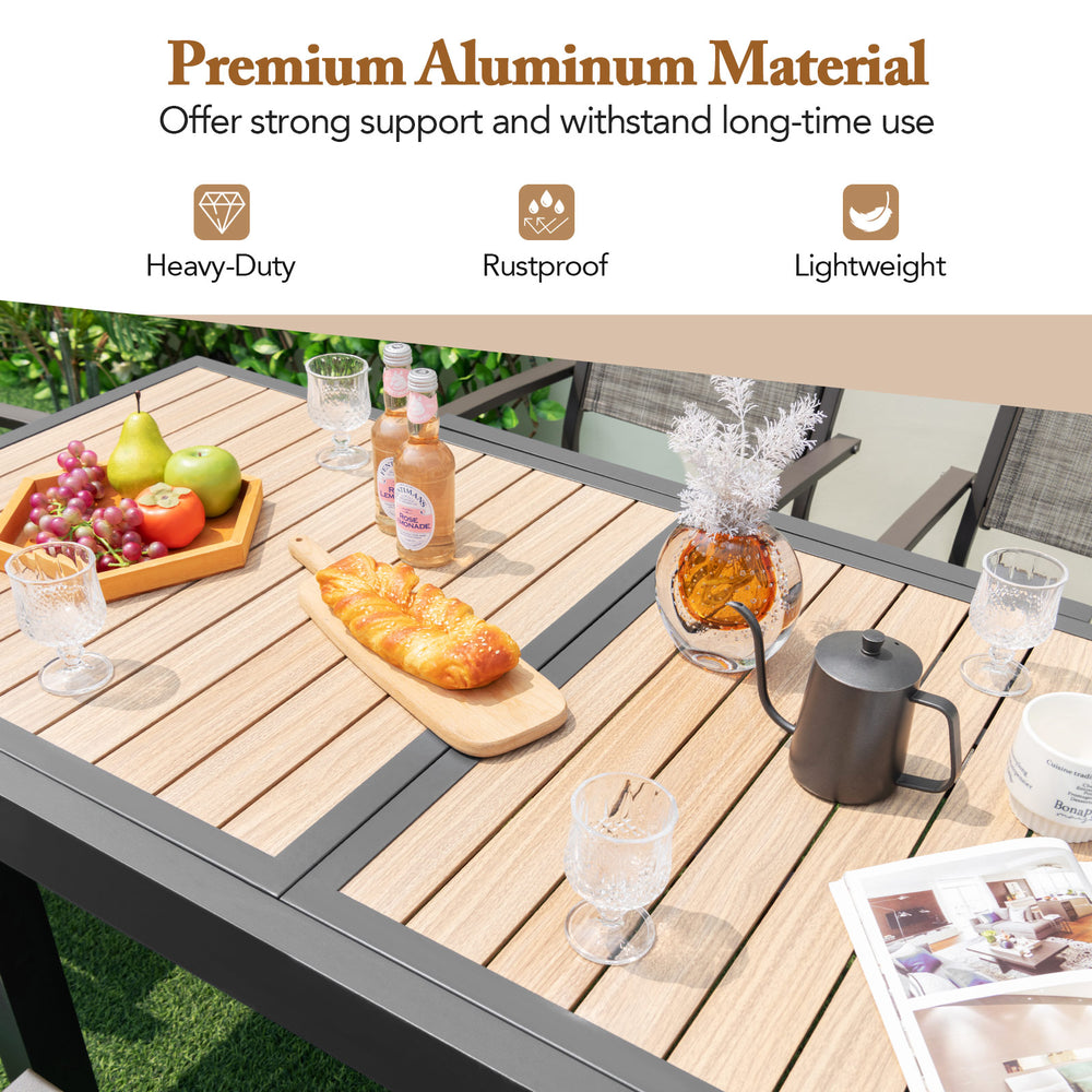 Extendable patio table with a wood-like slatted top, made from rustproof aluminum, accommodating 4-6 people.