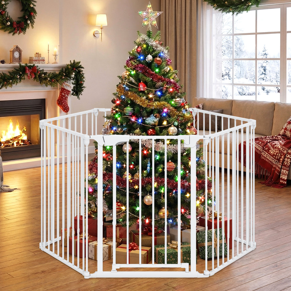 Extra wide 6-panel baby gate in white, adjustable from 34.5-154", used as a safety fence around a Christmas tree.