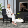 Fabric upholstered executive guest armchair with rubber wood legs, designed for comfort in modern reception areas.