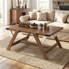 Farmhouse center table with walnut finish, featuring a spacious tabletop and decorative nailhead accents for living.