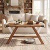 Farmhouse center table with walnut finish, featuring a spacious tabletop and anti-wobble legs, perfect for living room.