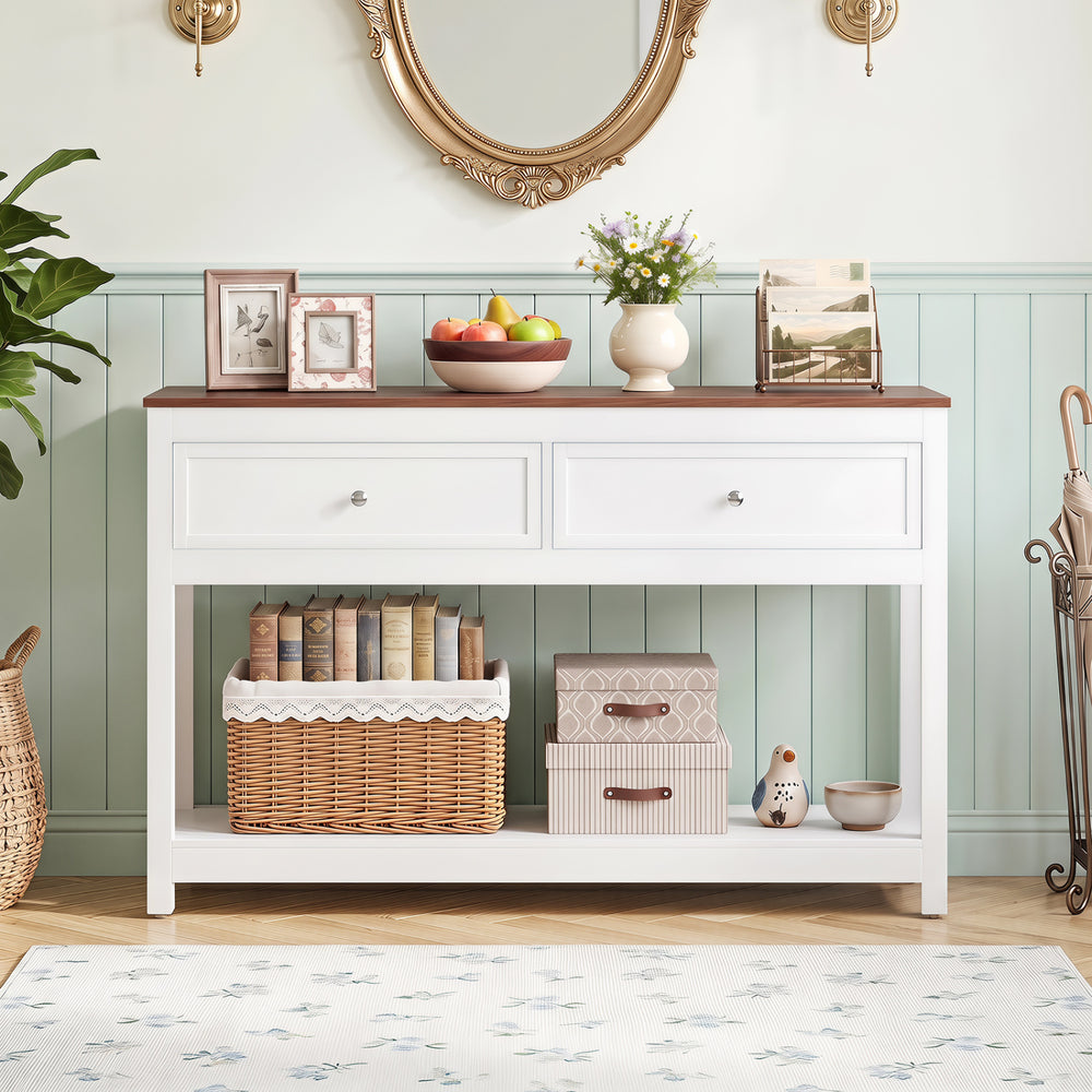 Farmhouse console table in white showcasing a spacious top, two drawers, and an open shelf for decorative storage.