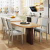 Grey fabric upholstered dining chairs with rubber wood frame and vintage nailheads, perfect for rustic and modern.