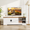 Farmhouse TV stand in white with wood top, showcasing sliding doors and adjustable shelves for stylish storage.