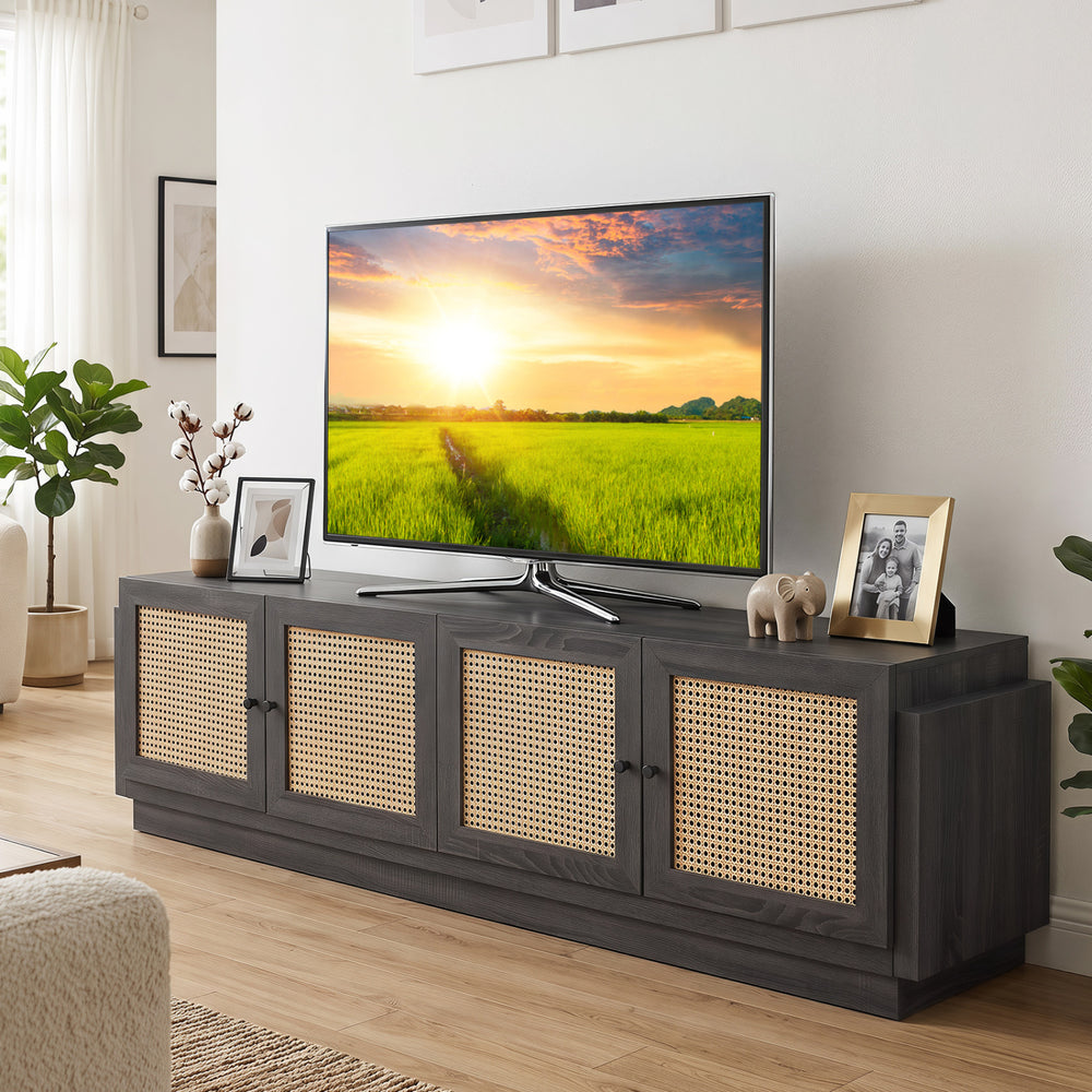 Farmhouse TV stand in black with elegant PE rattan doors, featuring a wide tabletop suitable for TVs up to 75 inches.