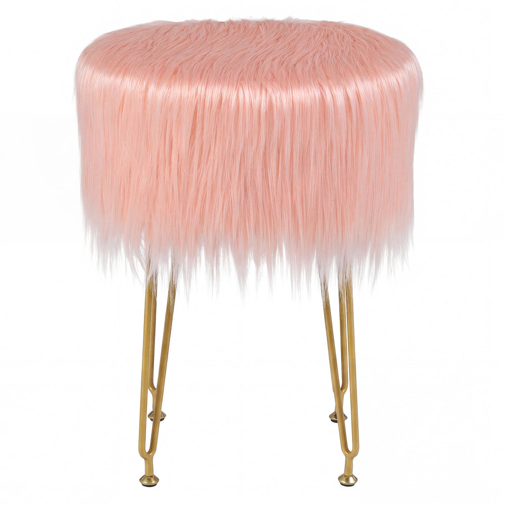 Pink faux fur vanity stool chair with metal legs, offering stylish decor and comfortable seating for bedroom or living.