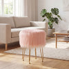 Pink faux fur vanity stool with metal legs, perfect for bedroom or living room decor and comfortable seating.