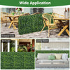 Faux greenery privacy screen fence in outdoor cafe setting, made of durable PE material for versatile indoor and.