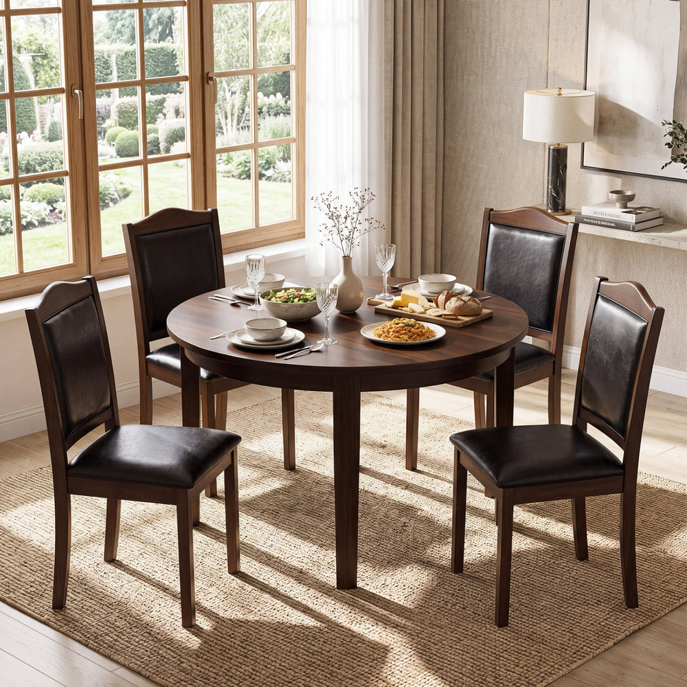 Walnut dining chairs set of four features faux leather upholstery and a sturdy rubber wood frame for stylish comfort.