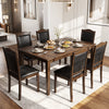 Set of four walnut dining chairs with faux leather upholstery, featuring padded seats and a rustic modern design.