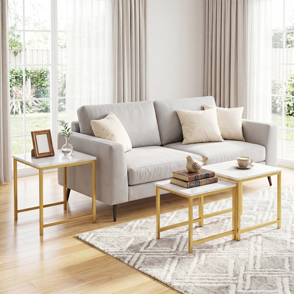 Faux marble nesting tables with a metal frame set of 3 in white, perfect for enhancing living room elegance and functionality.