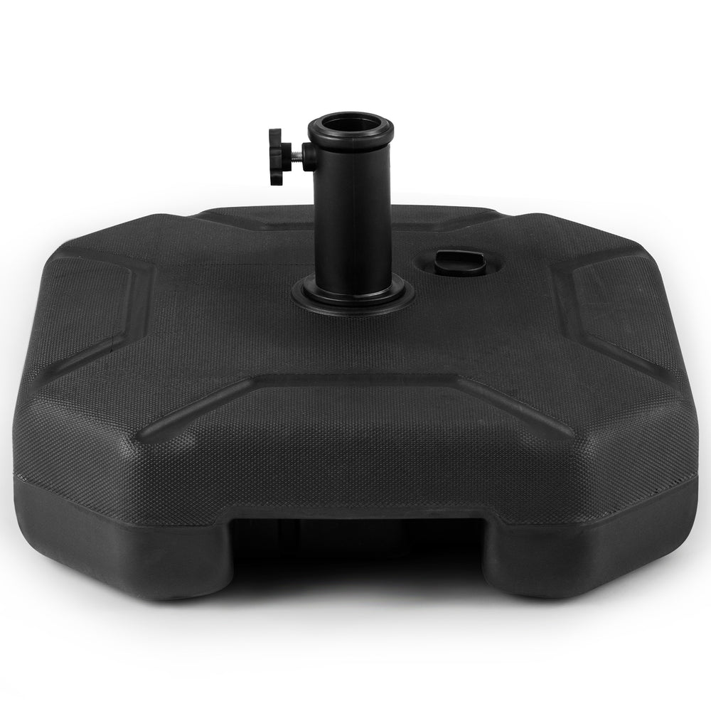 Heavy-duty 17-inch umbrella base made of HDPE, refillable with water or sand, features a carrying handle for easy.