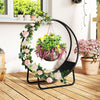 Curved 20-inch heavy-duty metal log rack with decorative flowers, ideal for firewood storage or outdoor events.