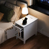 White flip top end table featuring a charging station, drawer, and magazine holder, ideal for bedside or sofa use.