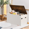 Flip-top storage chest in white with rustic brown lid, ideal for toys and shoes, fits various room decors.