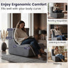 Curved gray floor chair with detachable headrest, designed for ergonomic comfort while reading or relaxing.
