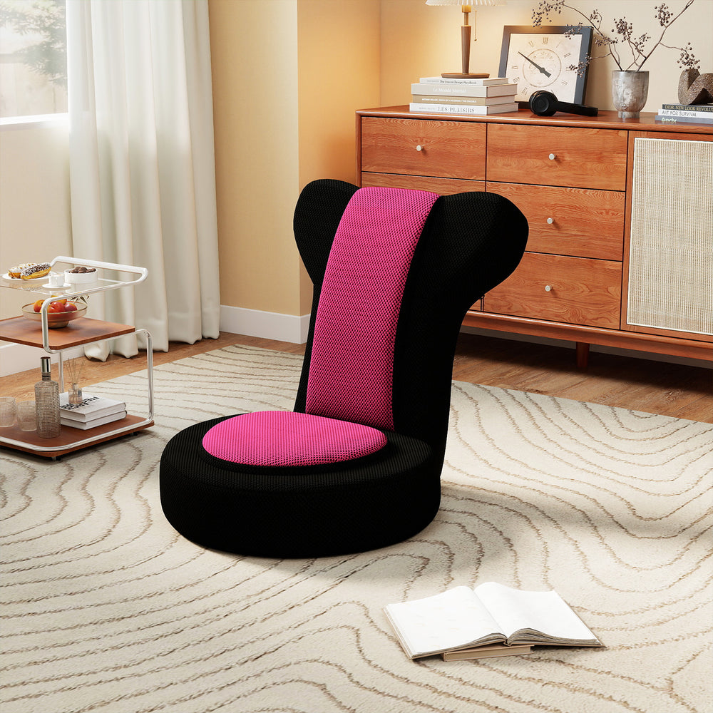 Comfy gaming leisure chair in black and pink with adjustable headrest, perfect for relaxing or gaming in any room.