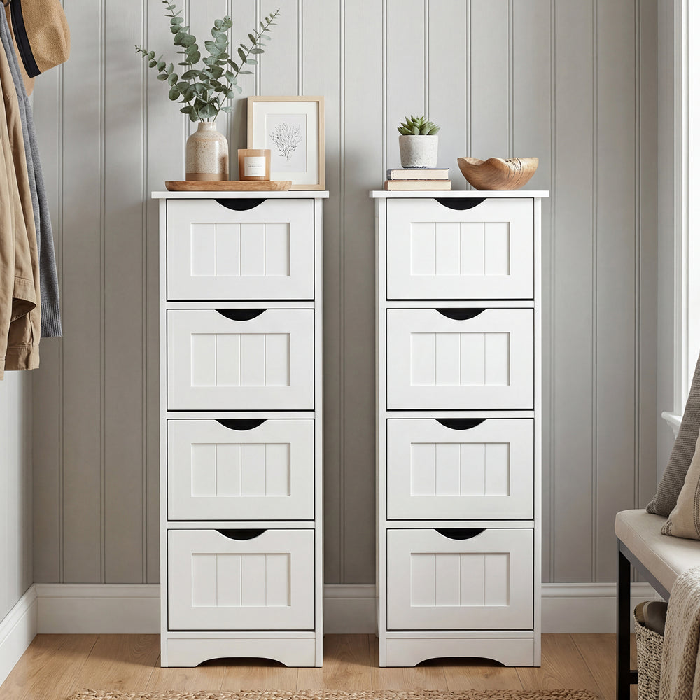 Two white wooden free-standing storage organizers with four drawers each, designed for narrow spaces and easy access.