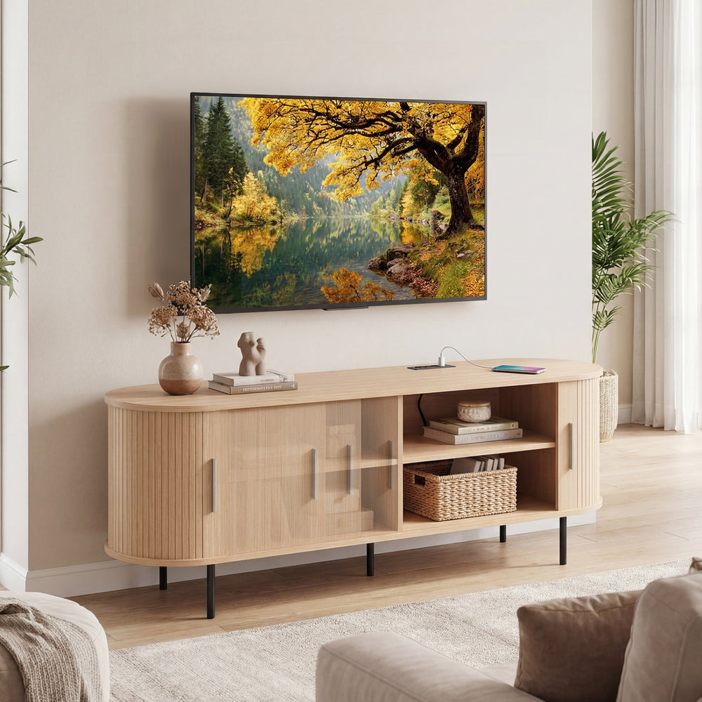 Fluted TV stand in natural finish with curved design, featuring 8 compartments and 2 AC outlets for versatile storage.