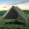 Foldable 2-person camping cot tent in green with pop-up design, elevated for wet ground protection, ideal for outdoor.