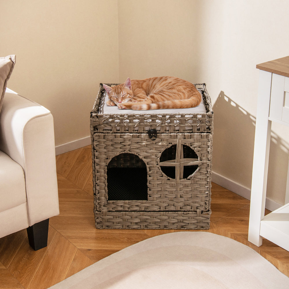 Foldable 2-tier grey rattan cat litter box enclosure with removable cushion, ideal for cozy lounging and easy cleaning.
