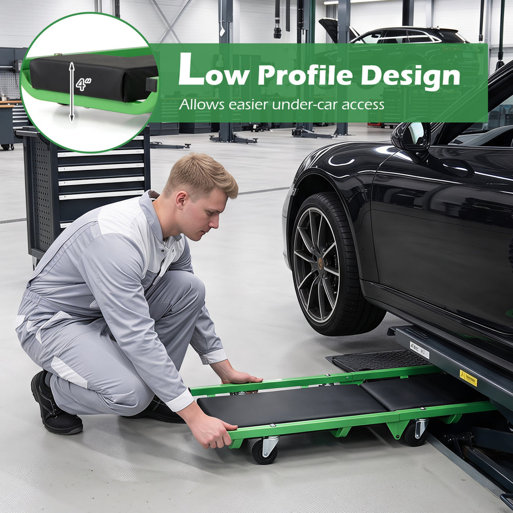 Foldable automotive creeper with low profile design and padded cushion for easy under-car access and comfort during repairs.