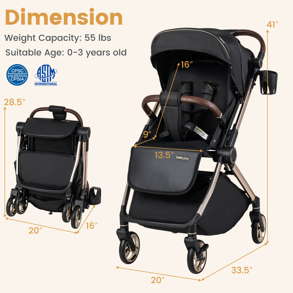 Foldable baby stroller in black features a reversible handle, adjustable backrest, and smooth-rolling wheels for versatile use.