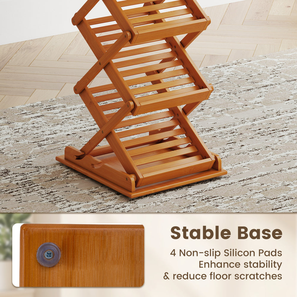 Foldable bamboo magazine rack with 5-tier inclined shelves and 4 non-slip silicon pads for stability and floor protection.