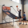 Foldable basketball arcade game with electronic scoring, featuring two players shooting hoops indoors for endless fun.