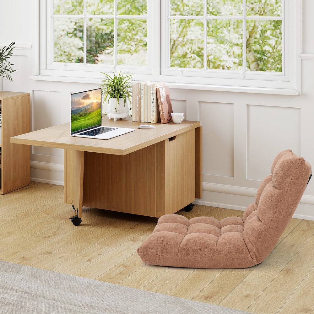 Foldable coffee table in oak with storage cabinet, showcasing a compact design and rolling wheels for easy mobility.
