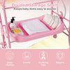 Pink foldable diaper changing table on wheels with bathtub, storage shelf, and changing pad for infant care