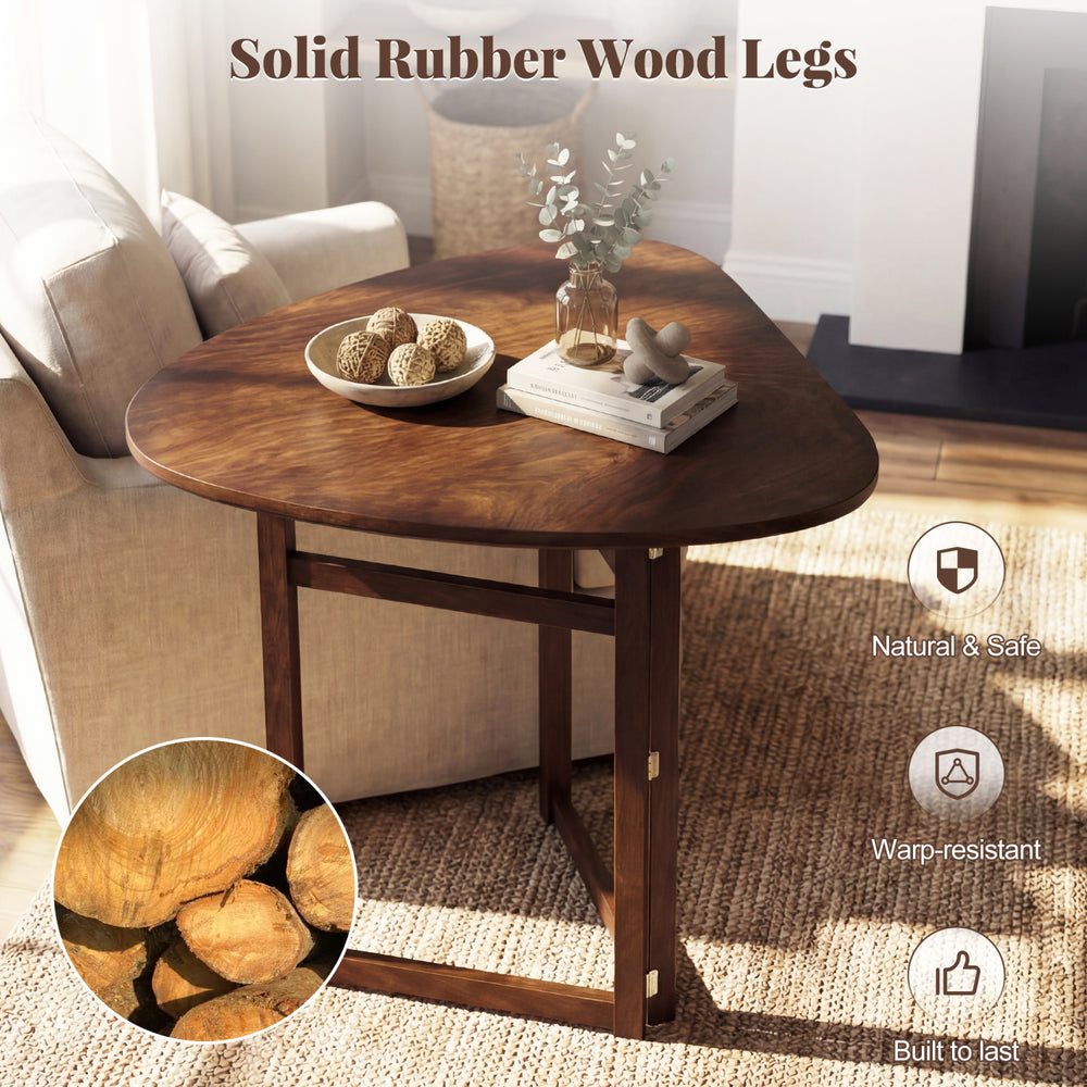 Triangular foldable dining table with walnut finish and solid rubber wood legs, perfect for small spaces and meals for.
