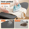 Foldable full-size ironing board with a thick-padded heat-resistant surface and collapsible iron rest for laundry rooms.