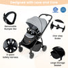 Foldable infant pram stroller in gray with a reversible seat, 5-point harness, and large storage basket for convenience.