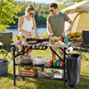 Foldable outdoor cook station in black features a spacious stainless steel top, removable shelves, and a trash bag holder for camping.