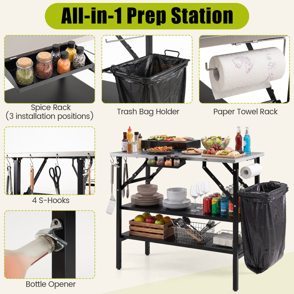 Foldable outdoor cook station with stainless steel top, removable shelves, trash bag holder, and spice rack for camping.